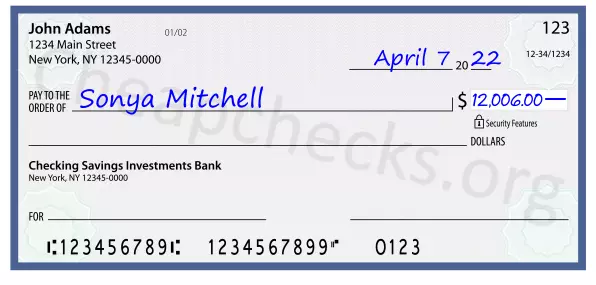 12006.00 dollars written on a check