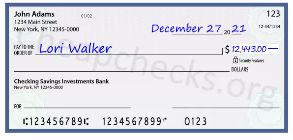 12443.00 dollars written on a check