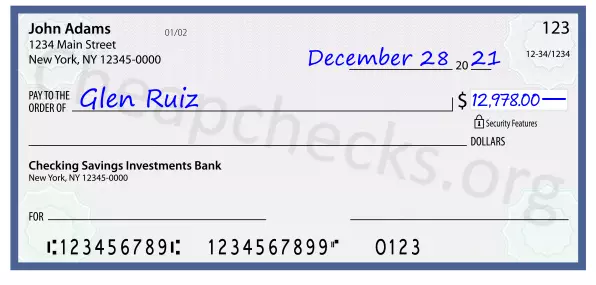 12978.00 dollars written on a check