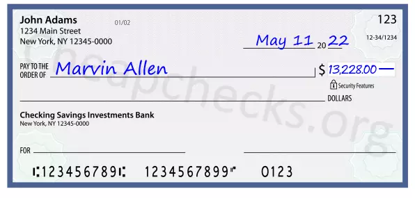 13228.00 dollars written on a check