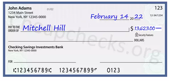 13623.00 dollars written on a check