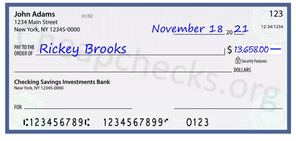 13658.00 dollars written on a check