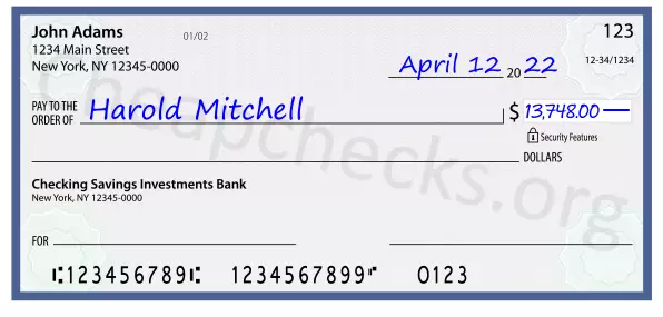 13748.00 dollars written on a check