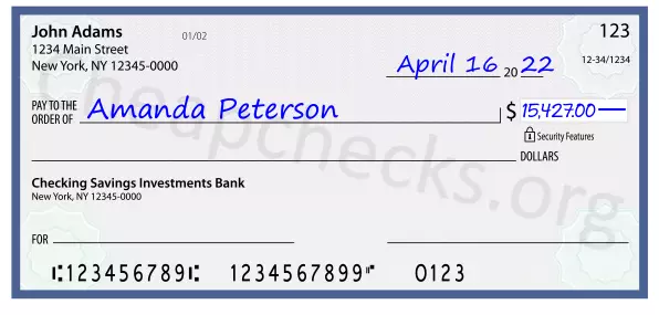 15427.00 dollars written on a check