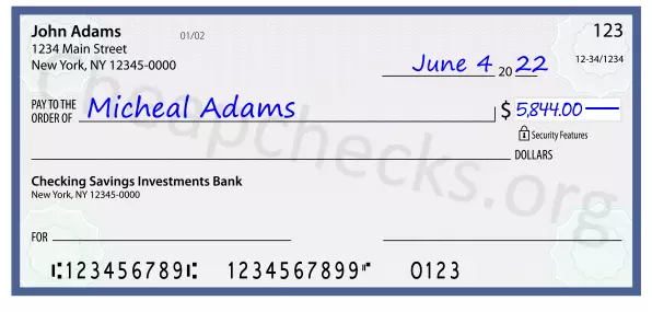 5844.00 dollars written on a check