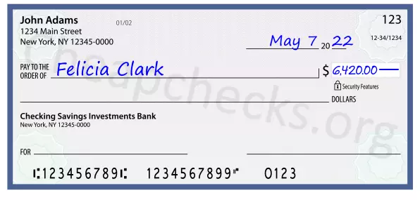 6420.00 dollars written on a check