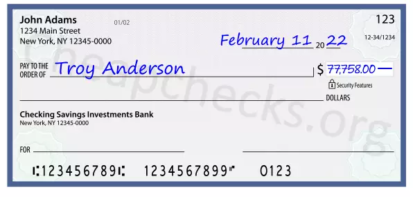 77758.00 dollars written on a check