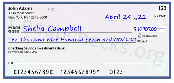 Ten Thousand Nine Hundred Seven and 00/100 filled out on a check