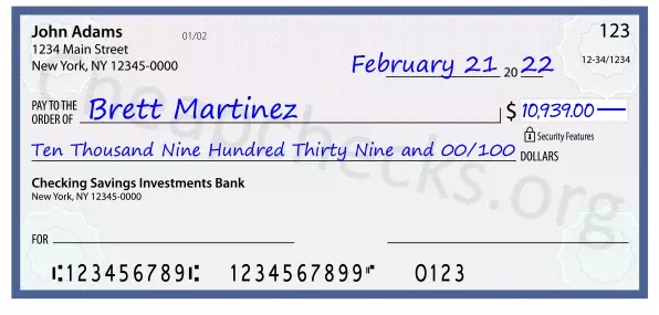 Ten Thousand Nine Hundred Thirty Nine and 00/100 filled out on a check