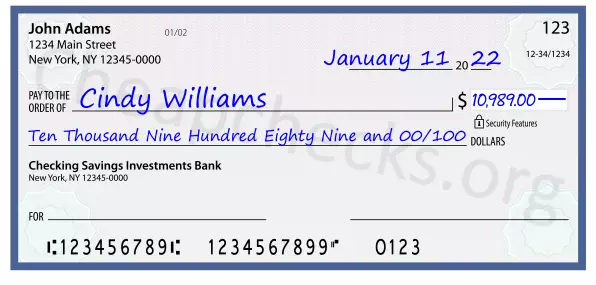 Ten Thousand Nine Hundred Eighty Nine and 00/100 filled out on a check