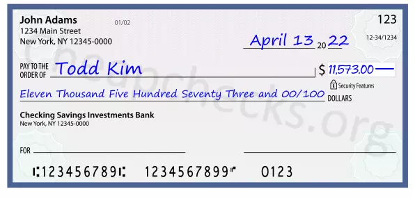 Eleven Thousand Five Hundred Seventy Three and 00/100 filled out on a check