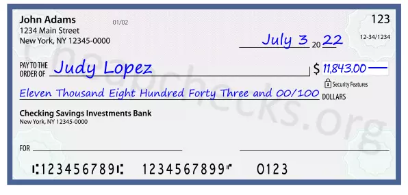 Eleven Thousand Eight Hundred Forty Three and 00/100 filled out on a check