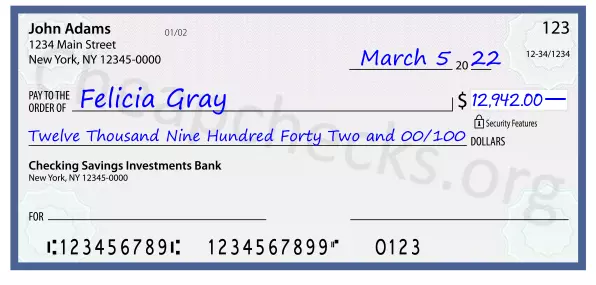 Twelve Thousand Nine Hundred Forty Two and 00/100 filled out on a check