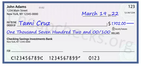 One Thousand Seven Hundred Two and 00/100 filled out on a check