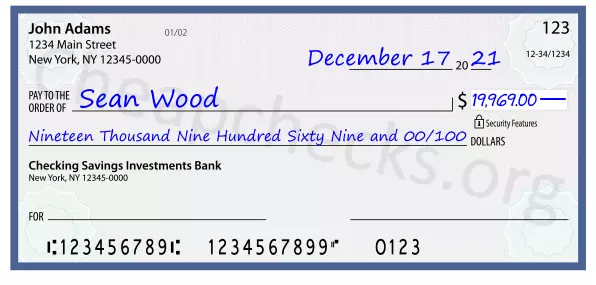 Nineteen Thousand Nine Hundred Sixty Nine and 00/100 filled out on a check