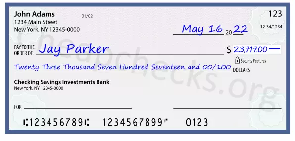 Twenty Three Thousand Seven Hundred Seventeen and 00/100 filled out on a check