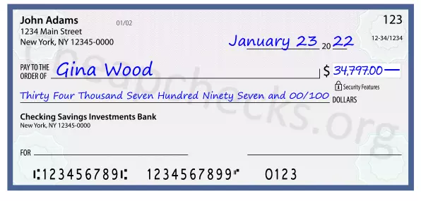 Thirty Four Thousand Seven Hundred Ninety Seven and 00/100 filled out on a check