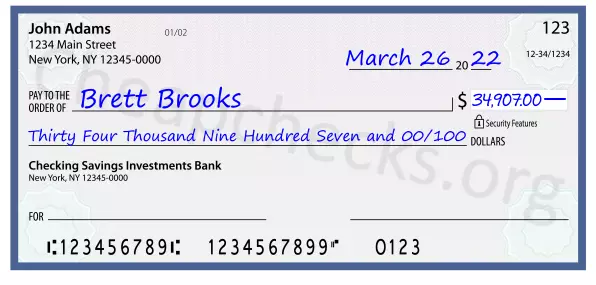 Thirty Four Thousand Nine Hundred Seven and 00/100 filled out on a check