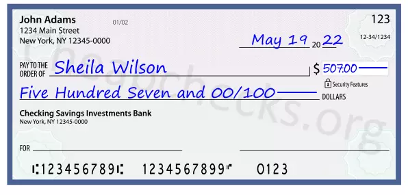 Five Hundred Seven and 00/100 filled out on a check