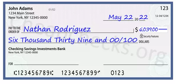 Six Thousand Thirty Nine and 00/100 filled out on a check