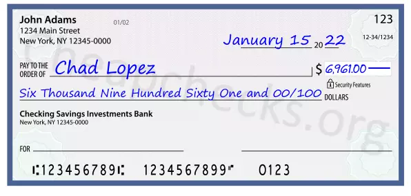 Six Thousand Nine Hundred Sixty One and 00/100 filled out on a check