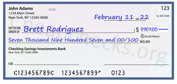 Seven Thousand Nine Hundred Seven and 00/100 filled out on a check