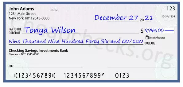 Nine Thousand Nine Hundred Forty Six and 00/100 filled out on a check